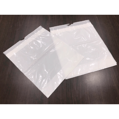 Side sealing bags with wicket holes made on a COSMO machine