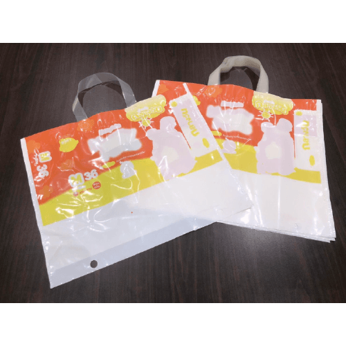 Soft loop handle bags with separate film handles